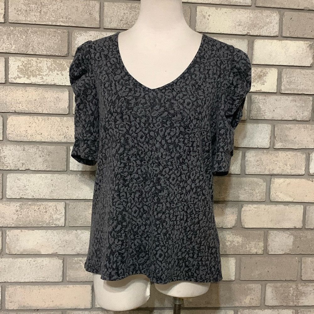 3for$20 blouse size medium runs smaller towards small